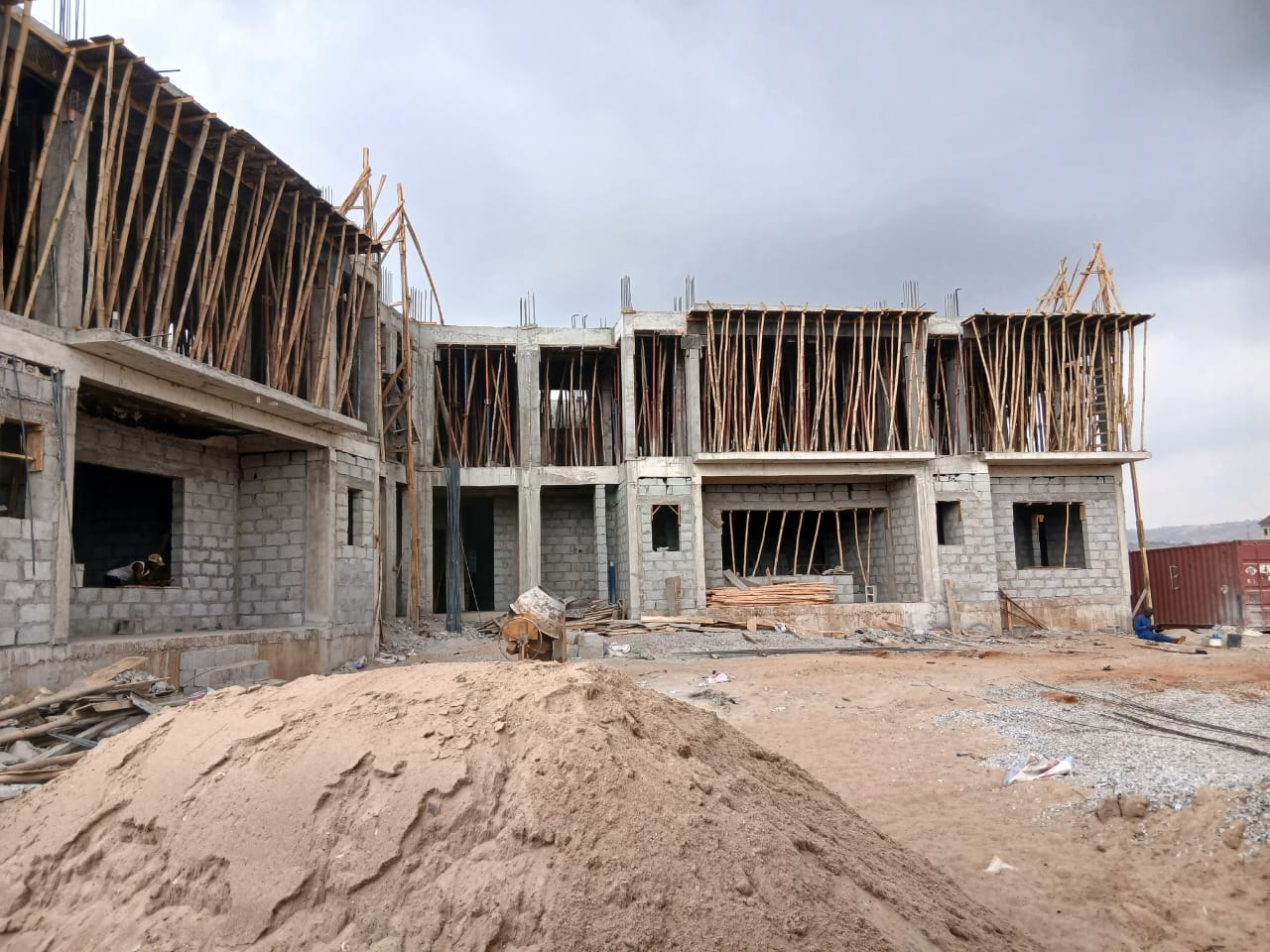 Active reinforced-concrete construction at Andrews Apartments in Jahi, Abuja